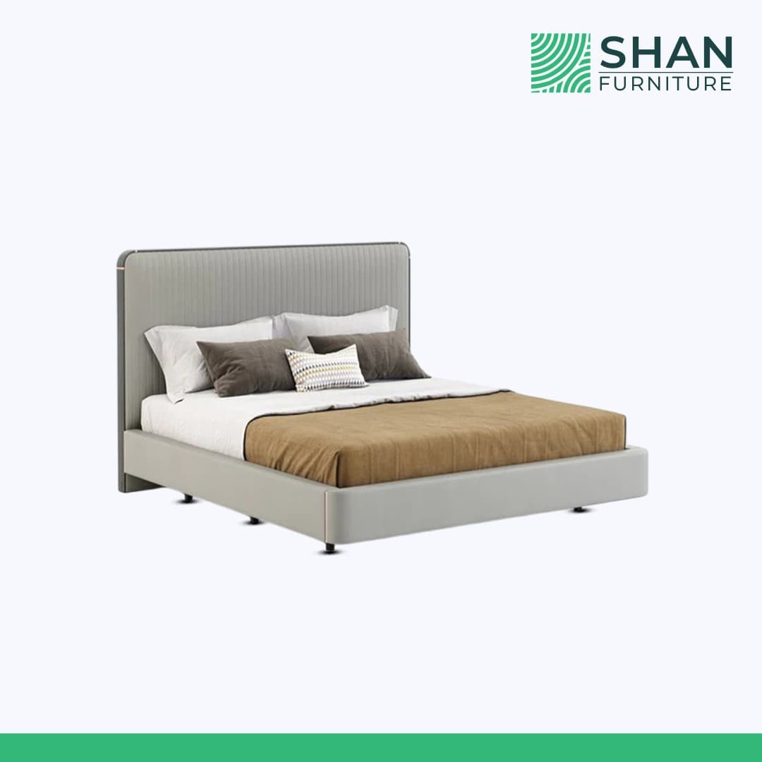 Grey Channel-Tufted Bed with Copper Trim
