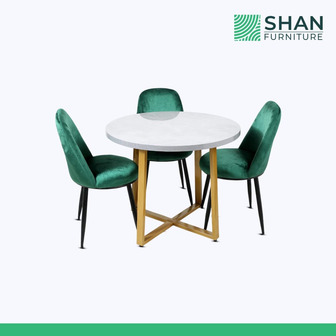 Round Dining Table with Green Velvet Chairs