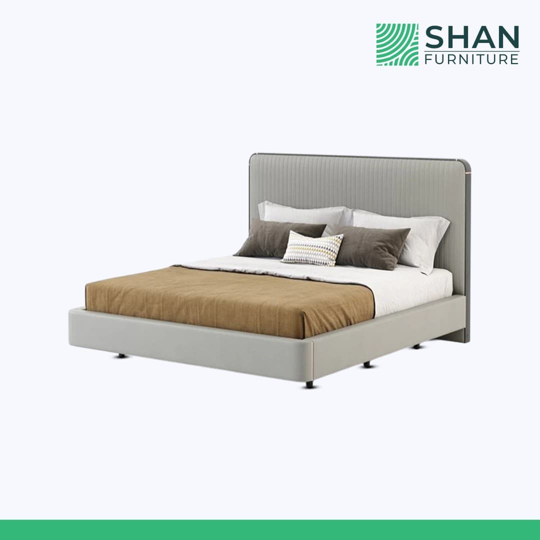 Grey Channel-Tufted Bed with Copper Trim